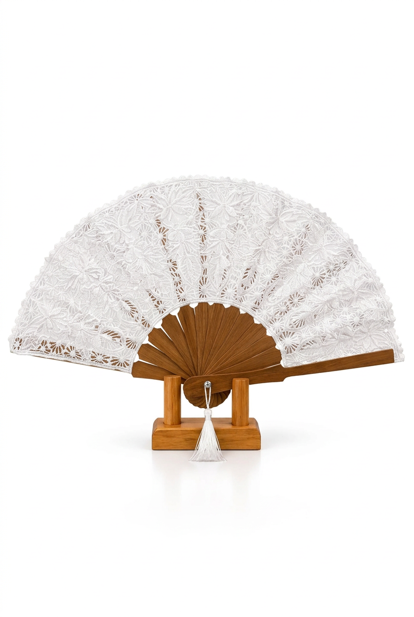 White embroidered folding fan on wooden stand against a white background